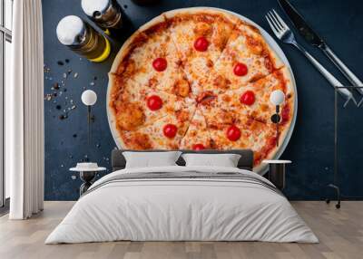 Italian food pizza with cheese, cherry tomatoes, and tomato sauce. Wall mural