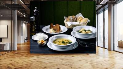 three-course set on the table in the restaurant, cafe menu, soup, second and salad Wall mural