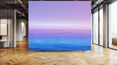 A beautiful blue ocean with a purple sky in the background Wall mural