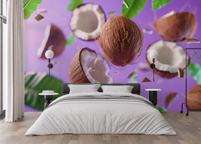 Fresh Coconuts and Leaves Floating on Vibrant Purple Background Wall mural