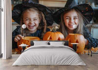 Halloween fun for kids with carved pumpkins and witch hats Wall mural