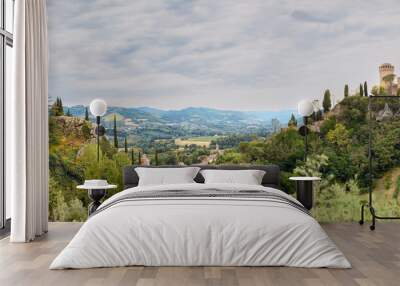 Brisigella, Ravenna, Emilia-Romagna, Italy. Beautiful panoramic aerial view of the medieval city and Manfredian fortress with clock tower. Famous symbols of the defensive city Wall mural