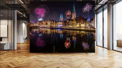 Fireworks in Lübeck skyline with cathedral and harbor, Lübeck, Germany. New Years Eve. Wall mural