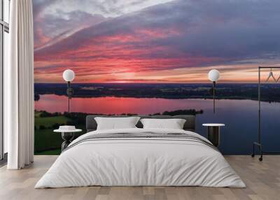 Sunset over the lake in nature reserve  Westensee, Schleswig-Holstein, Germany  Wall mural