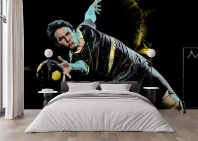 one caucasian handball player young man isolated on black background with speed light painting effect motion blur Wall mural