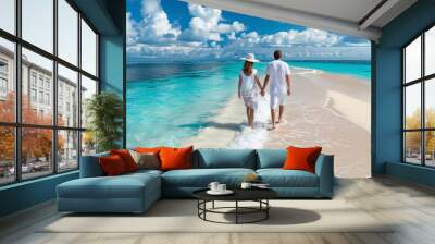 Banner of A young couple enjoys their summer vacation walking along a tropical beach on a sunny day on white sand,adventurous spirit to travel. copy space Wall mural