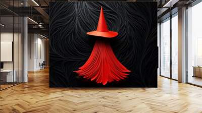 Minimalistic witch dressed in a red hat and flowing red skirt in wavy paper cutout style, standing against a dark swirling background.The design combines a sense of mystery and magic,seasonal artwork Wall mural