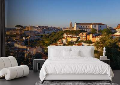 Aerial view of Lisbon cityscape, budlings with red roofs in Portugal, during sunset, the second-oldest European capital city Wall mural