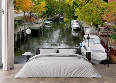 boats docked in a river Wall mural