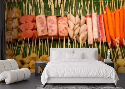 Thai style street food include seafood and chicken skewers including crab legs and shrimp Wall mural