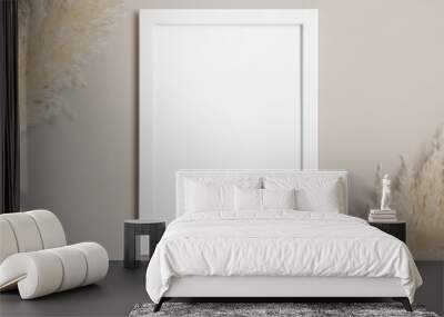 Top view of a white frame mockup with pampas decoration. Wall mural