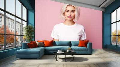 Cute young woman blonde hair with bob haircut isolated on flat pink background with copy space. Cute girl in white simple t-shirt.  Wall mural