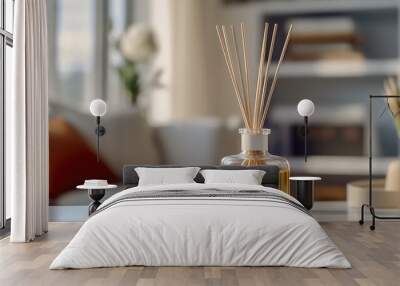 Reed diffuser on white table in the living room. Cozy minimalist interior, home fragrances. Wall mural