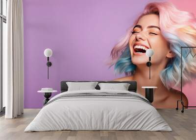 Young beautiful smiling happy woman with rainbow colored wavy hair isolated on flat purple background with copy space, banner template of Creative hair coloring. Wall mural