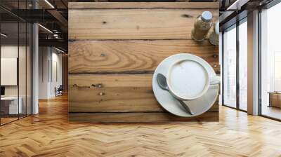 Hot art Latte Coffee in a cup on wooden table and Coffee shop bl Wall mural