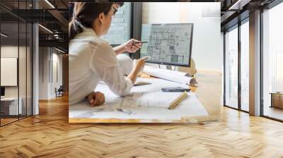 professional architect designer structural engineer team colleagues working office looking computer discussing building plan design project. Wall mural