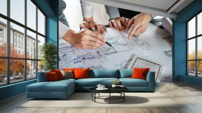 Real-estate concept, Two engineer and architect discussing blueprints data working and digital tablet on construction building project Wall mural