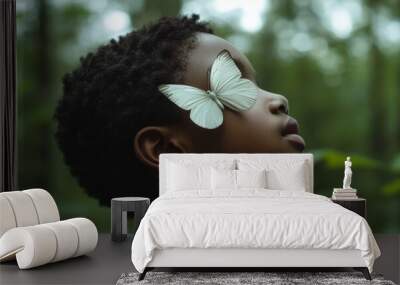 aesthetic photo of african american boy with white butterfly on his face Wall mural