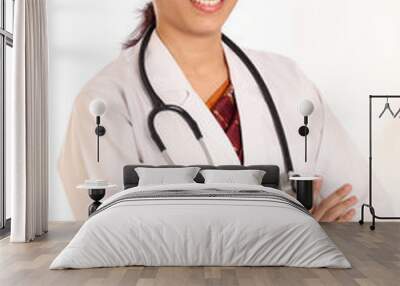 Cheerful young female doctor with crossed arms Wall mural