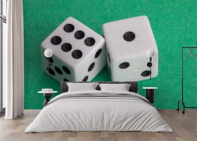 lucky seven - a pair of dice on a green background showing six and one Wall mural