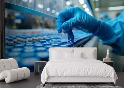 Closeup image of hands in sterile gloves examining a batch of medical vials, ensuring compliance and safety standards in a clean production environment Wall mural