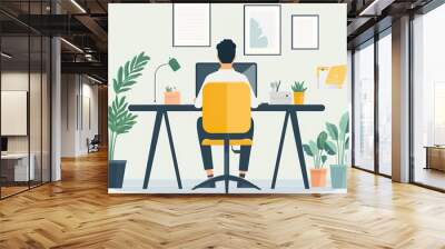 man sitting at the desk in an office Wall mural