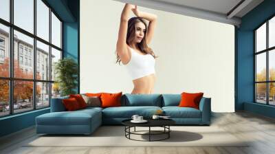  Perfect slim toned young body of the girl . An example of sports , fitness or plastic surgery and aesthetic cosmetology.


 Wall mural