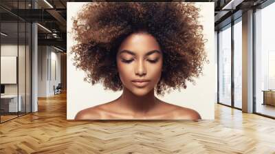 Beautiful black woman . Beauty portrait of african american woman with clean healthy skin on beige background.  Smiling beautiful afro girl.Curly black hair Wall mural