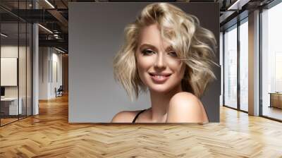 Beautiful model girl with short hair .Beauty woman with blonde curly hairstyle dye .Fashion, cosmetics and makeup Wall mural