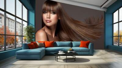 Beautiful model woman with shiny  and straight long hair. Keratin  straightening. Treatment, care and spa procedures. Beauty  girl smooth hairstyle Wall mural