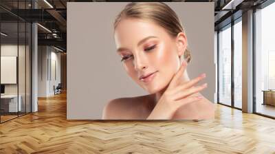 Beautiful young woman with clean fresh skin .Girl beauty face care. Facial treatment . Cosmetology and Spa
 Wall mural