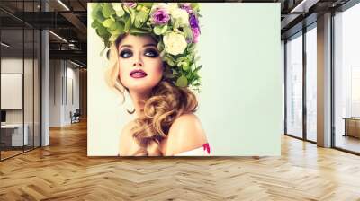 Girl spring . Beautiful model with flower wreath on his head . Makeup smoky eyes . Summer girl with trendy makeup .
 Wall mural