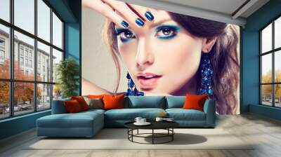 Model with blue make-up and manicure Wall mural