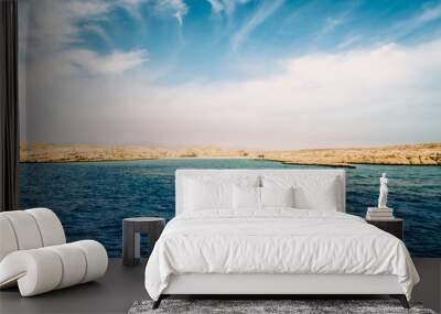 rocky coast of the Red Sea and.blue sky with clouds Wall mural