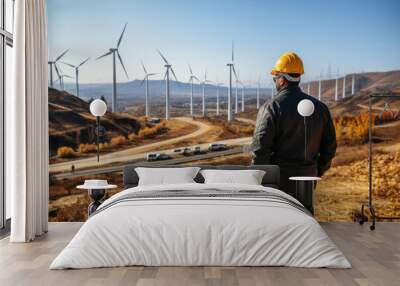 Back view of energy engineer on background of wind power station Wall mural