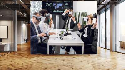 VR, business meeting conference. Multiethnical male and female business people wearing virtual reality headsets, touching air and gesturing at the office, working with new project or program Wall mural