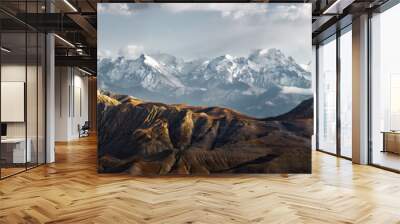 Panoramic view of snow mountains range landscape Wall mural