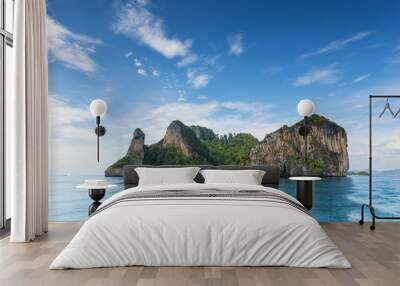 thailand chicken head island cliff over ocean water during tourist boat trip in railay beach resort Wall mural