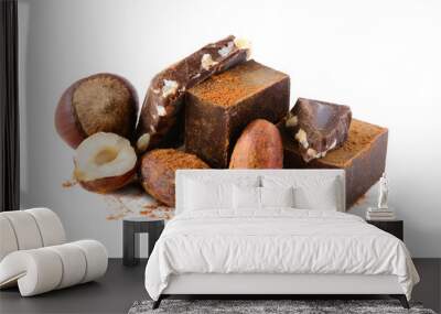 Chocolate blocks with cocoa beans and nuts isolated on white background. Wall mural