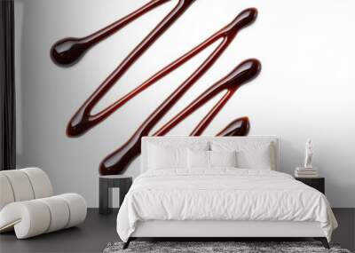 Chocolate syrup drop isolated on a white background Wall mural