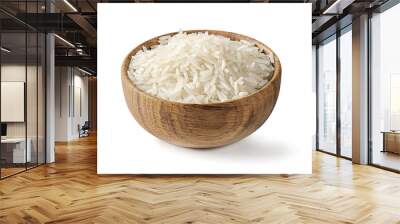 Dry white long rice basmati in wooden bowl isolated on a white background. Wall mural