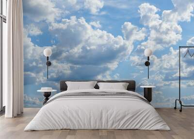 Bright sunny clouds, beautiful sky at day as background Wall mural