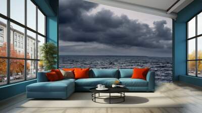 dark stormy sea and dramatic clouds, gloomy nature Wall mural