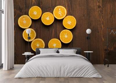 dark wooden background with blank space for text and fresh sliced orange fruits as a heart shape - natural and healthy food. Wall mural