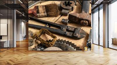 Old vintage household hand tools still life on a wooden background in a DIY and repair concept Wall mural