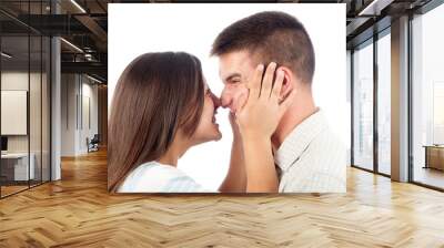 young couple in love having fun isolated on white Wall mural