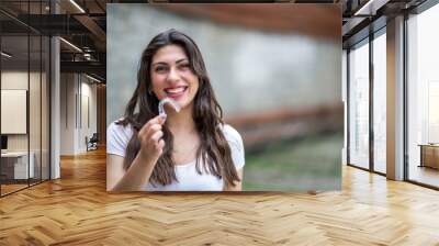 Beautiful Smiling Turkish Woman with invisible teeth bracket aligner Wall mural