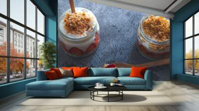 Two jar of strawberry pudding magnolia desert over rustic backdrop with gloomy lighting copy space Wall mural