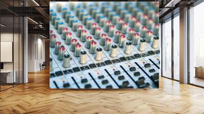 Close-up of the handles and sliders of an audio mixer. Blurred back. Wall mural