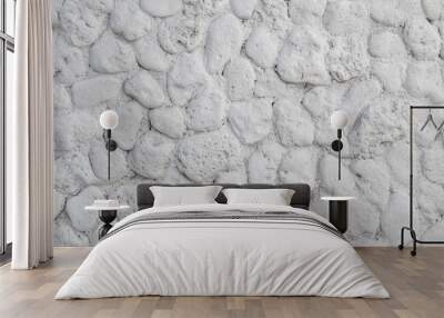 White wall made of natural stone. Texture light stone back. Wall mural